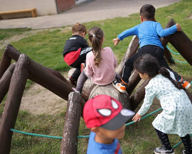 File picture of children playing outside in a playground (Photo by Sean Gallup/Getty Images)
