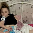Codee pictured minutes after the surprise birth, by which time paramedic had arrived at her Milton Keynes home