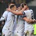 With Mike Williamson finding consistency in his team-selections, he may only make one change from the weekend when MK Dons play Grimsby Town at Stadium MK tonight