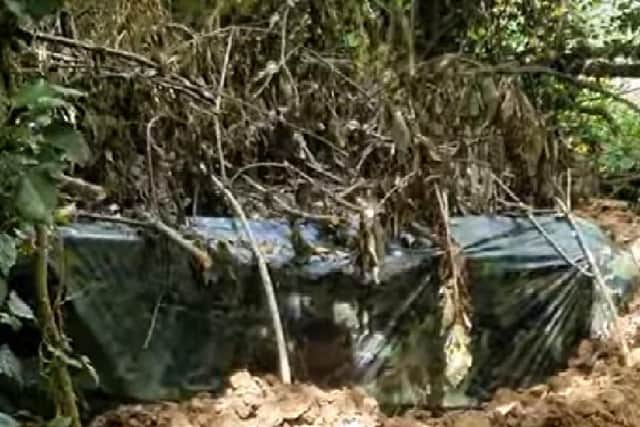 This is the makeshift home that Shane has built on the Milton Keynes island