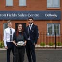 Robert Hettzman, Sales Advisor at Bellway Moreton Fields; Bella Pettit, Buckingham Swans rugby player sponsored by Bellway; and Luke Moore, Sales Advisor at Bellway Moreton Fields, are pictured outside the new sales centre at the Moreton Fields development.