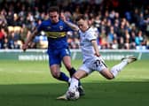 MK Dons boosted their automatic promotion hopes with a win over Crewe Alexandra.