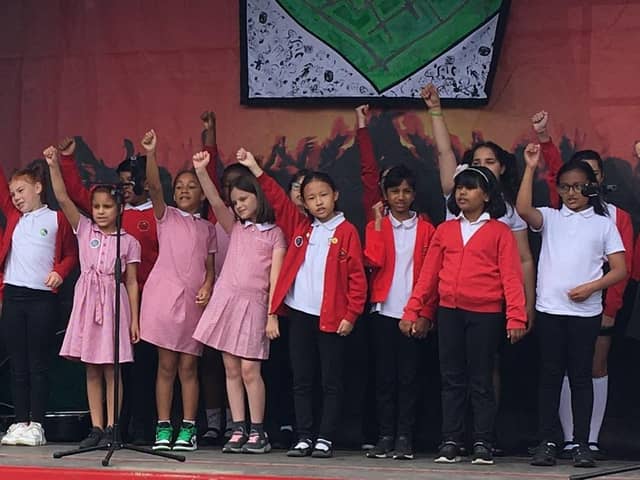Children from Jubilee Wood primary school sing their special song about how good it is to live on Fishermead in Milton Keynes