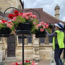 Volunteers work hard all year round to keep the floral displays in Stony Stratford looking beautiful