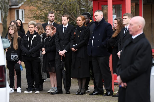 Mourners gather at Crownhill Crematorium ahead of the funeral which was held just after midday