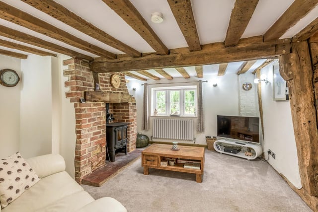 The lounge/diner has a feature log burner which is set in a brick fireplace with a wood mantle and a tiled hearth, in keeping with the farmhouse style
