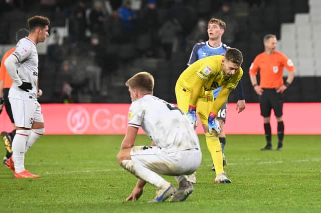 MK Dons were shell-shocked by Fleetwood's 90th minute winner at Stadium MK