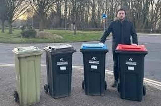MK City Council leader Pete Marland shows how many wheelie bins most households will have