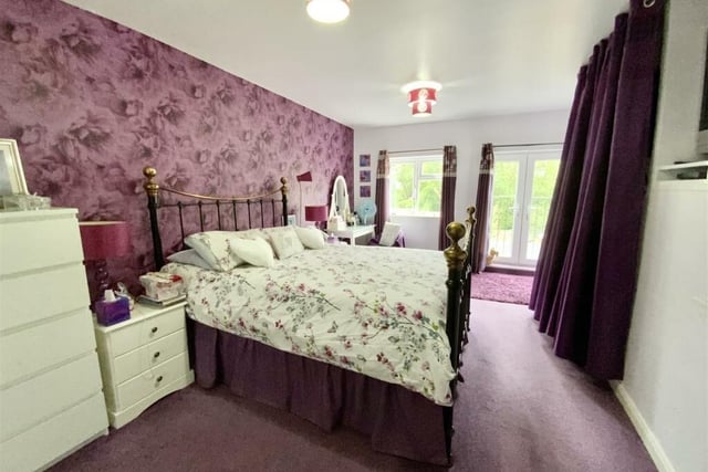 One of the seven bedrooms the house has to offer