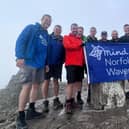 Three Peaks Challenge - Hikers reach the summit.