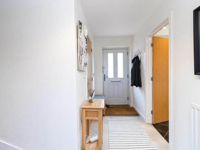 The hallway features a double glazed front door with cloakroom, lounge/diner and kitchen leading off