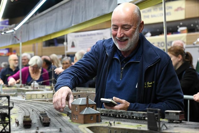 An exhibitor gives his layout a final tweak