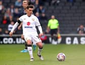 MK Dons are a point off the play-offs after a surge up the table.