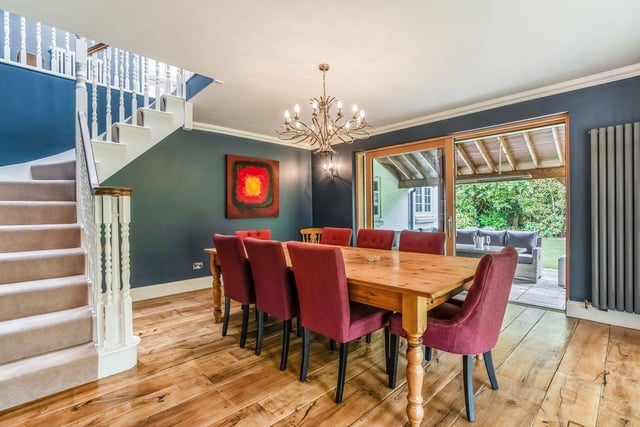 The dining room opens onto a heated, covered terrace.