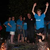 Firewalker Sue Harding braves the burning embers to help MK SNAP