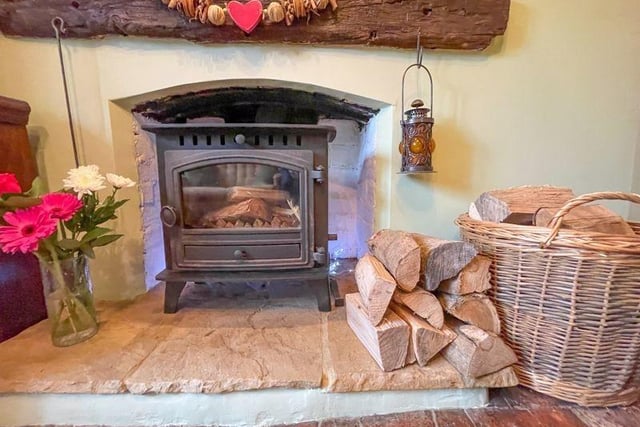 A log burner is among the many features of this stylish modernised period property