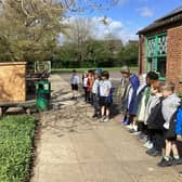 Pupils from Olney Infant School hearing about their new wildflower turf from George Davies Turf