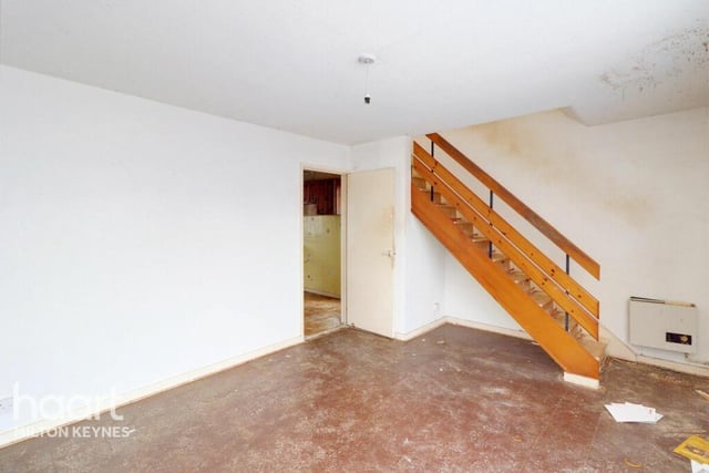 Open plan stairs lead to the first floor