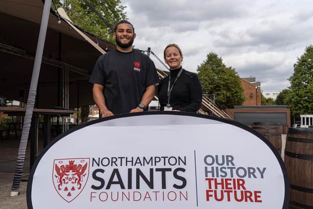 Northampton Saints captain Lewis Ludlam is pictured with the Foundation’s Managing Director Catherine Deans.