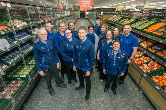 Manager Nathan Hawkins and his team are ready to welcome customers to Aldi Westcroft. PHOTOGRAPH BY RICHARD GRANGE / UNP (United National Photographers).