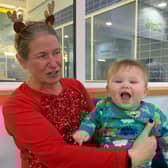 One of the little swimmers in their festive jumper