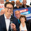 Johnny Luk canvassing during a rally in Milton Keynes last month