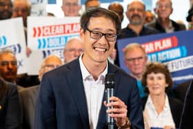 Johnny Luk canvassing during a rally in Milton Keynes last month