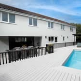 The property is finished to a high specification with private garden and heated swimming pool.