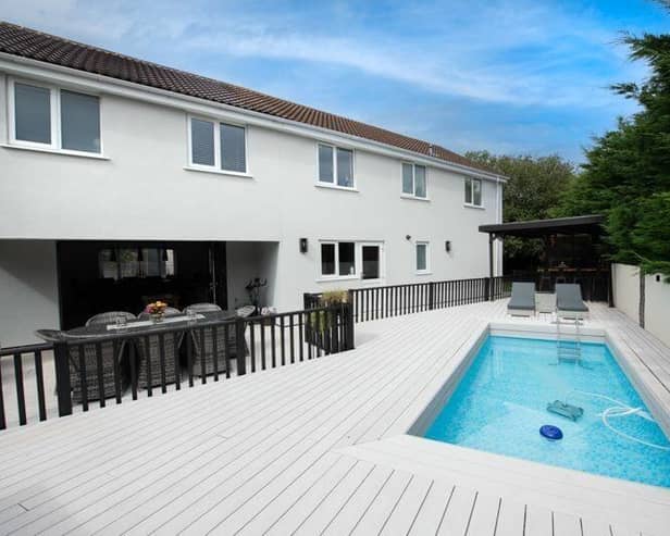 The property is finished to a high specification with private garden and heated swimming pool.