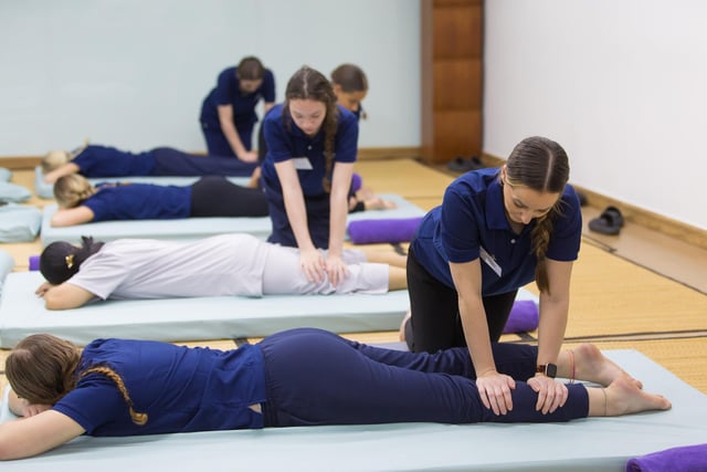Meanwhile the beauty students were hard at work learning Thai massage