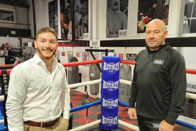 Callum Biscoe with trainer Kevin McCarthy