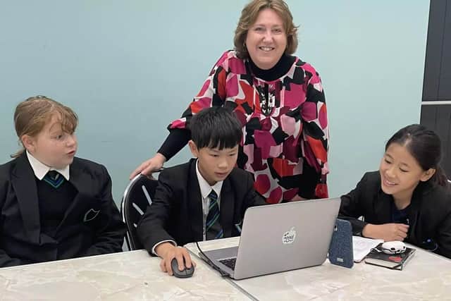Councillor Jane Carr with school pupils at The Mead Centre in Newport Pagnell