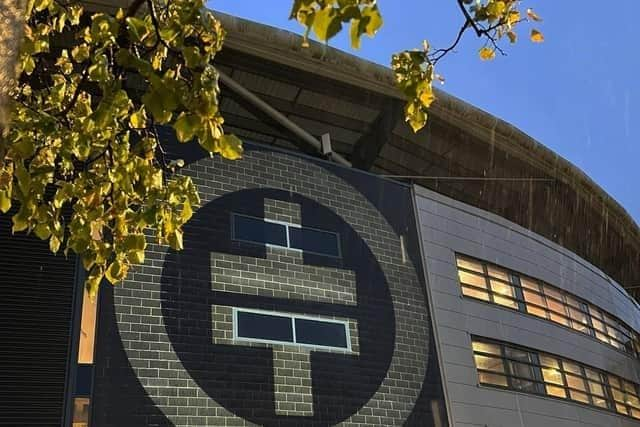 Take That's double T logo appeared in lights on Stadium MK on Wednesday