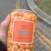 Tamsin and Charlie's girl of baked beans was happily received by King Charles during his visit to MK