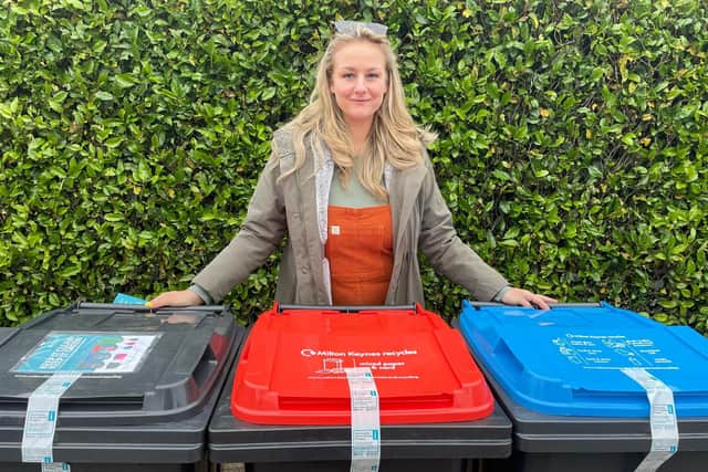 Cllr Lauren Townsend with the new wheelie bins each household in Mk will shortly receive