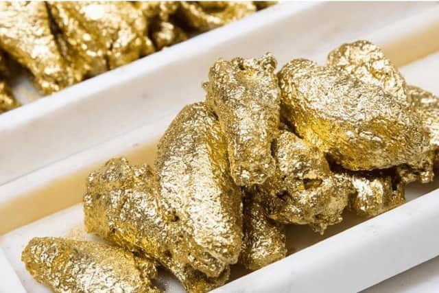 The chicken wings are coated in edible 24ct gold