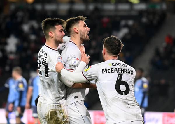 MK Dons are likely to stick with much of the side which beat Portsmouth at Fratton Park on Saturday when they take on Leicester City