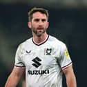 Will Grigg has signed from Chesterfield from Milton Keynes Dons.