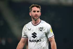 Will Grigg has signed from Chesterfield from Milton Keynes Dons.