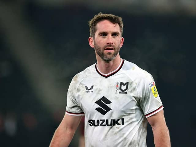 Will Grigg has signed from Chesterfield from Milton Keynes Dons.