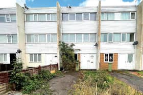 The terraced house is in a cul-de-sac on the estate