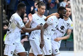MK Dons celebrate Mo Eisa's goal in the 1-1 draw with Portsmouth on Good Friday at Stadium MK