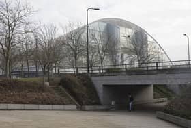 MILTON KEYNES, ENGLAND - JANUARY 23:  A woman walks through an underpass near the Xscape centre and snowdome on January 23, 2017 in Milton Keynes, England. Milton Keynes in Buckinghamshire marks the 50th anniversary of its designation as a new town today. The town is home to around 25,000 people and approximately 130 roundabouts. It was designed by British architect and planner Derek Walker.  (Photo by Dan Kitwood/Getty Images)