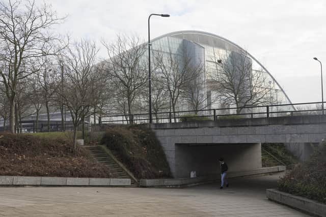 MILTON KEYNES, ENGLAND - JANUARY 23: A woman walks through an underpass near the Xscape centre and snowdome on January 23, 2017 in Milton Keynes, England. Milton Keynes in Buckinghamshire marks the 50th anniversary of its designation as a new town today. The town is home to around 25,000 people and approximately 130 roundabouts. It was designed by British architect and planner Derek Walker. (Photo by Dan Kitwood/Getty Images)