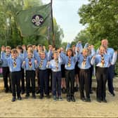 Hands high for adventure! Hanslope and Castlethorpe Sea Scouts celebrate becoming official, ready to tackle kayaking, boating, and building lifelong friendships.
