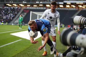 MK Dons are looking to get the job done this season after last year's play-off pain.