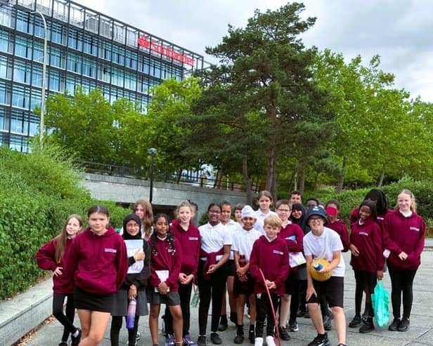 The year 6 pupils outside Unity Place ready to pitch their ideas to the 'Dragons'.