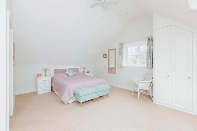 All the bedrooms are a  good size with carpet flooring  under floor heating and room control panel. This one features a vaulted ceiling with electric fan, spotlights, double glazed window to side aspect and fitted wardrobes and drawers.