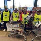Members of the Bletchley Lions Club have been collecting donations of food and cash at  Morrisons at Westcroft