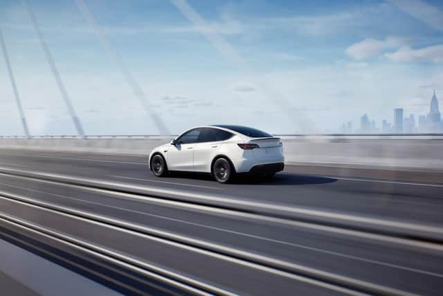 Tesla Model Y on the road. Photo: TESLA